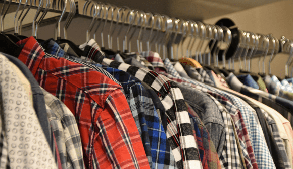 clothes on hangers in a closet